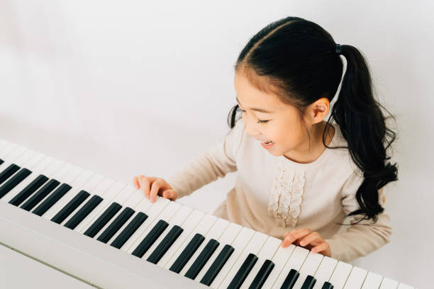 manfaat belajar piano sejak dini